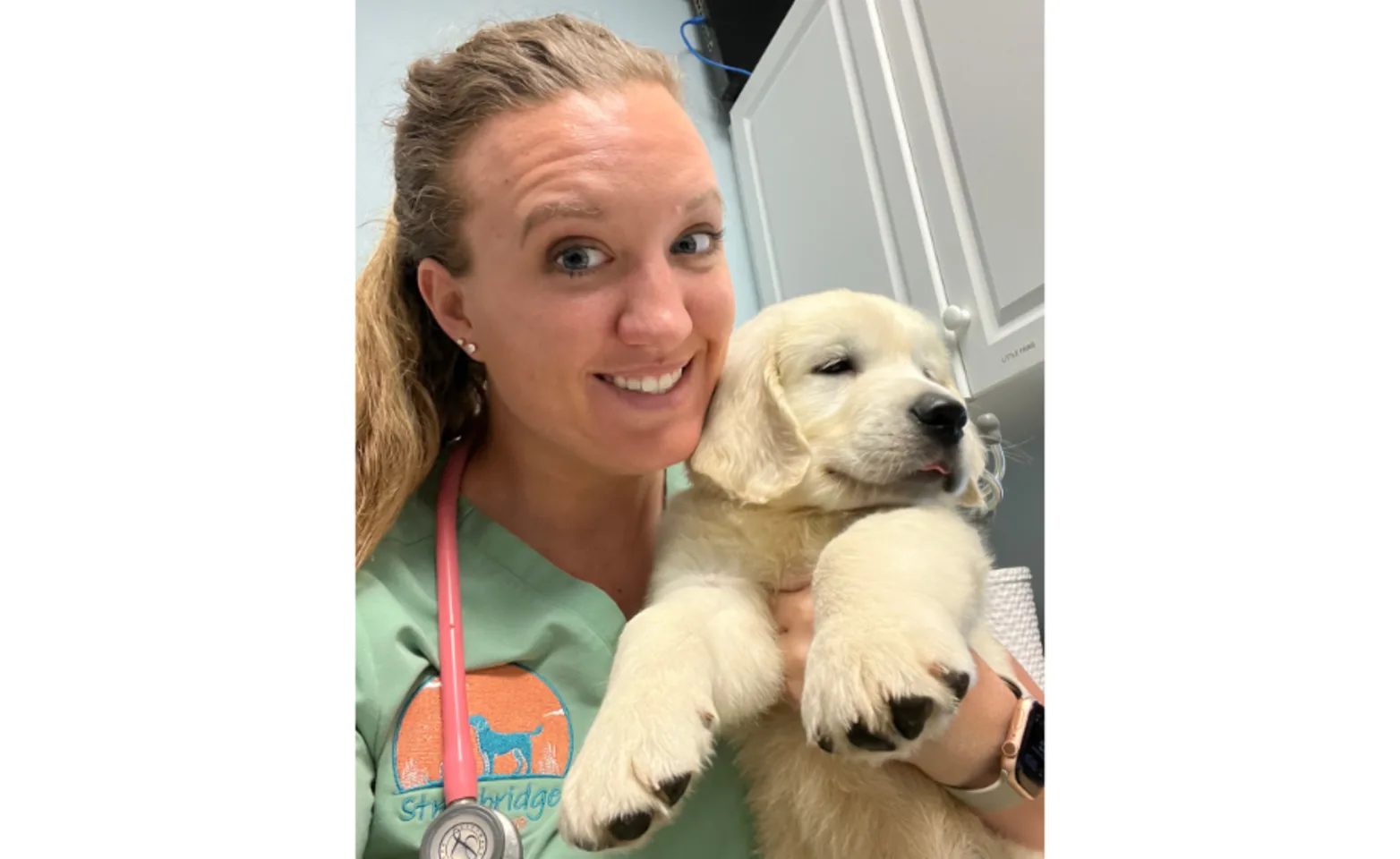 Dr. Samantha Stephens holding a puppy